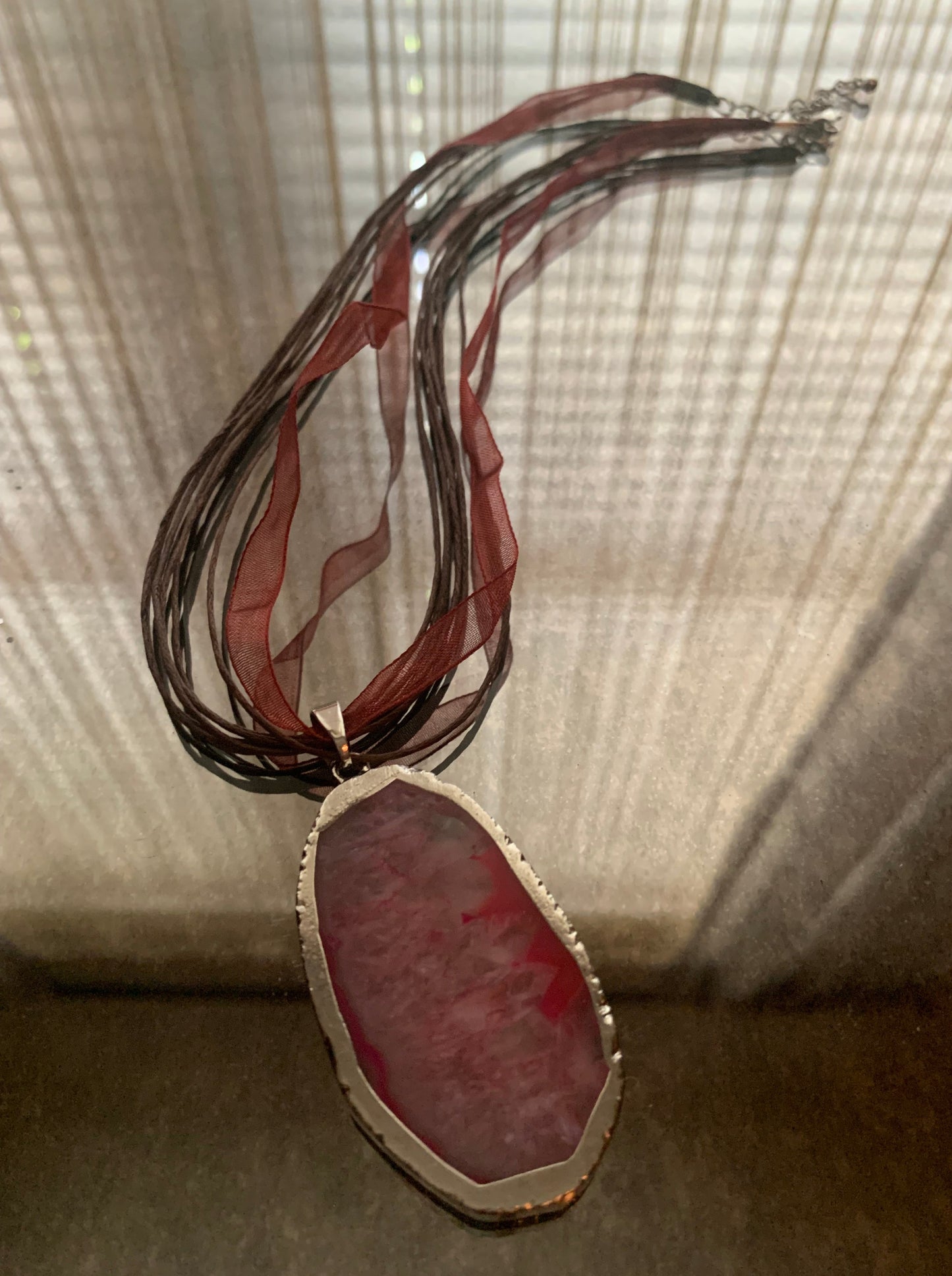 Necklace, Amber Coral Pink Mixed Stone Pendant embellish in gold accented with 18" nylon multi color ribbon and cord with lobster clasp and extension chain.