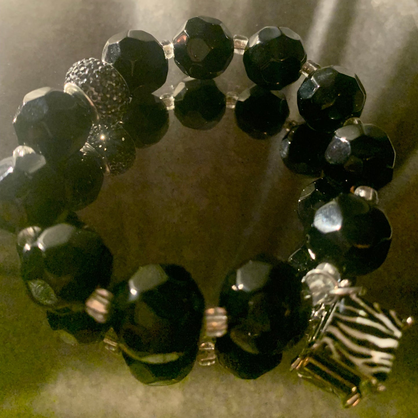 Bracelet/Stylish Black Crystal Glass Beads, Accented with Zebra Print Charm, Clear and Pave Spacers.