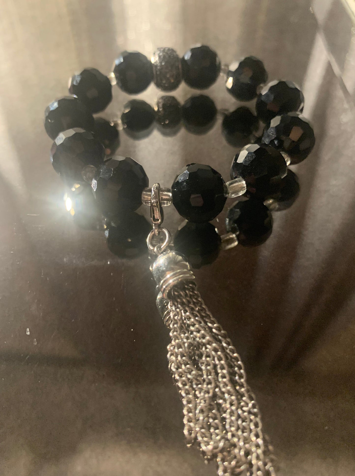 Bracelet/Elegant Black Crystal Glass Beads, Accented with Silver Tassel Charm, Clear and Pave' Spacers.