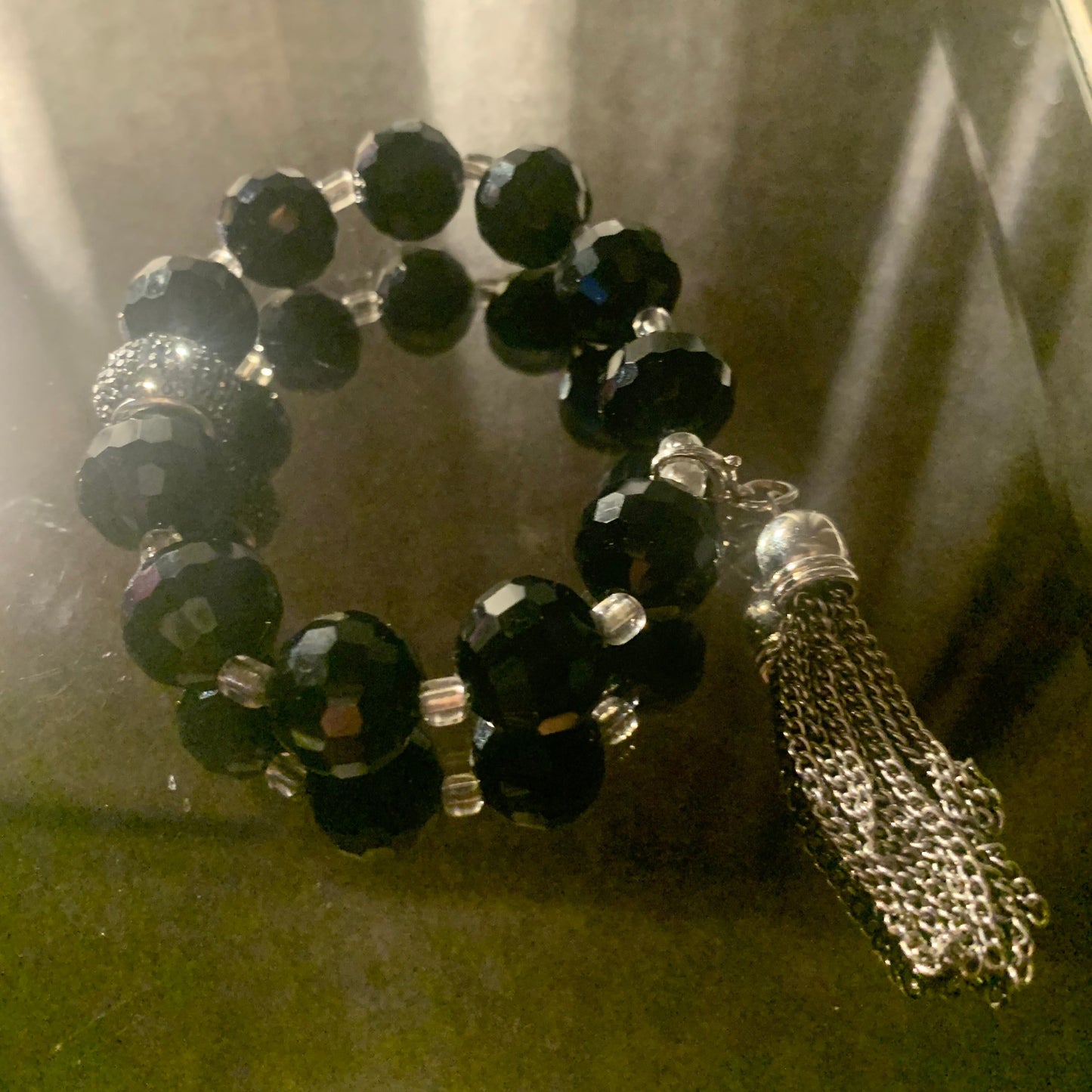 Bracelet/Elegant Black Crystal Glass Beads, Accented with Silver Tassel Charm, Clear and Pave' Spacers.