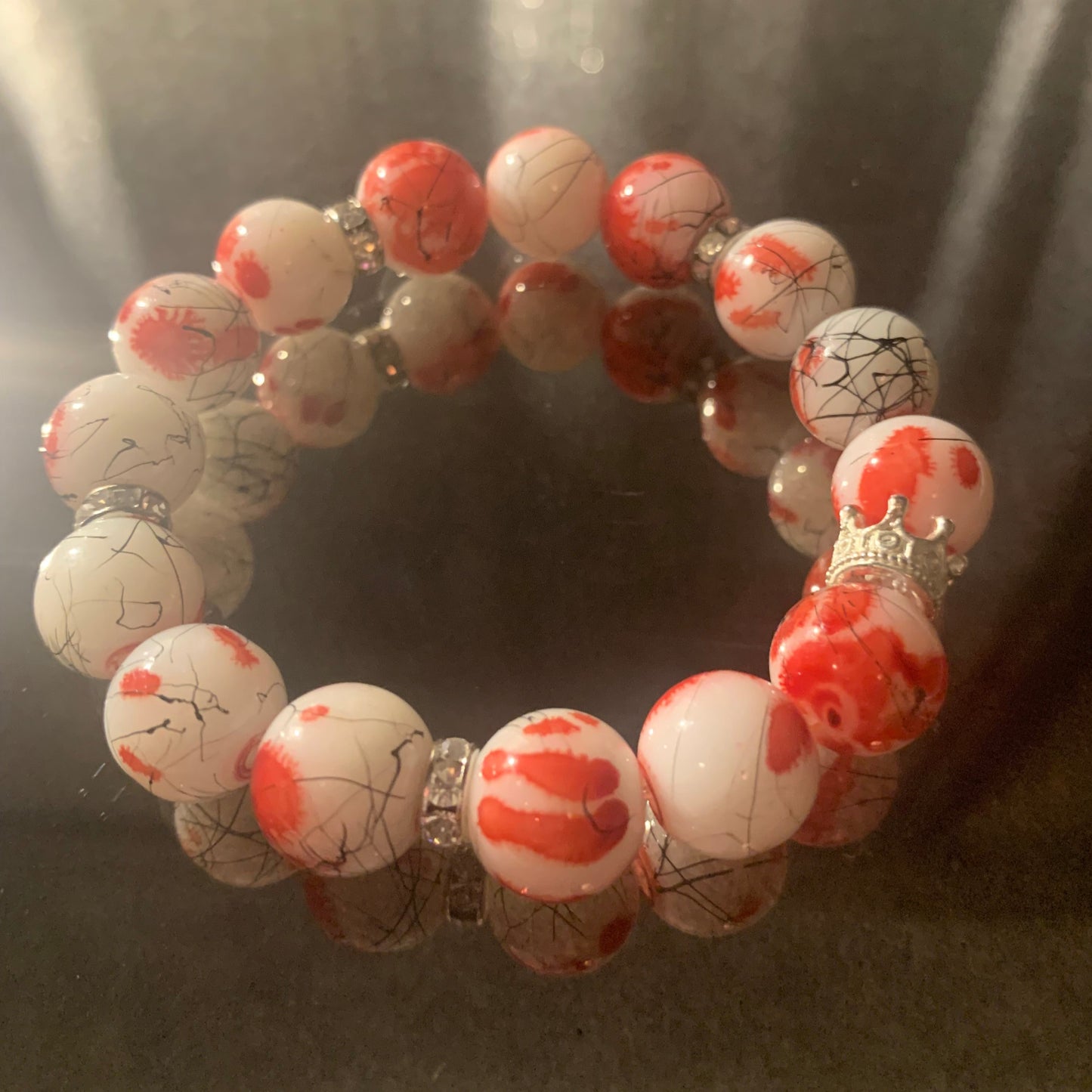 Bracelet/Graffiti Print Fashion Bracelet of Red and White Glass Beads, Silver Crown, and Mini Rhinestone Spacers.