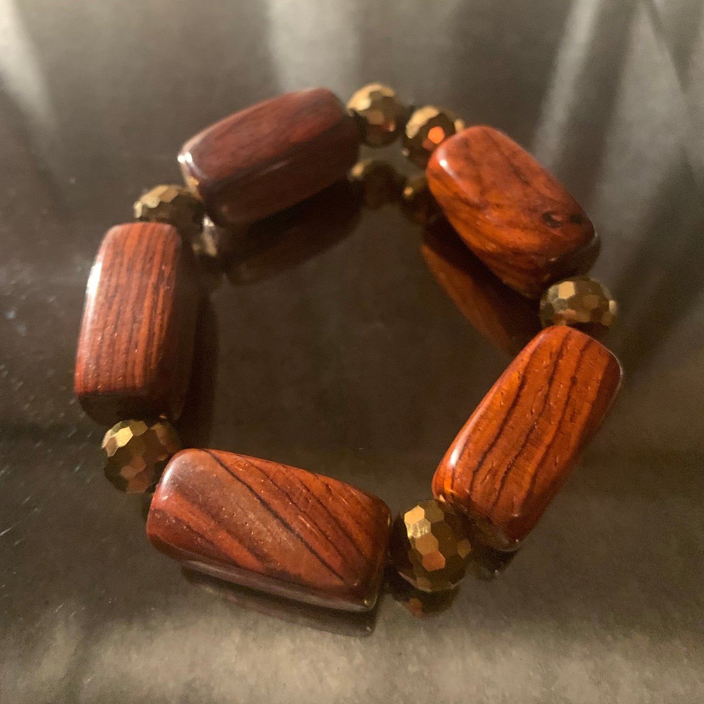 Bracelet/Trendy Wooden Arm Candy Accented with Gloden Glass Beads Spacers.